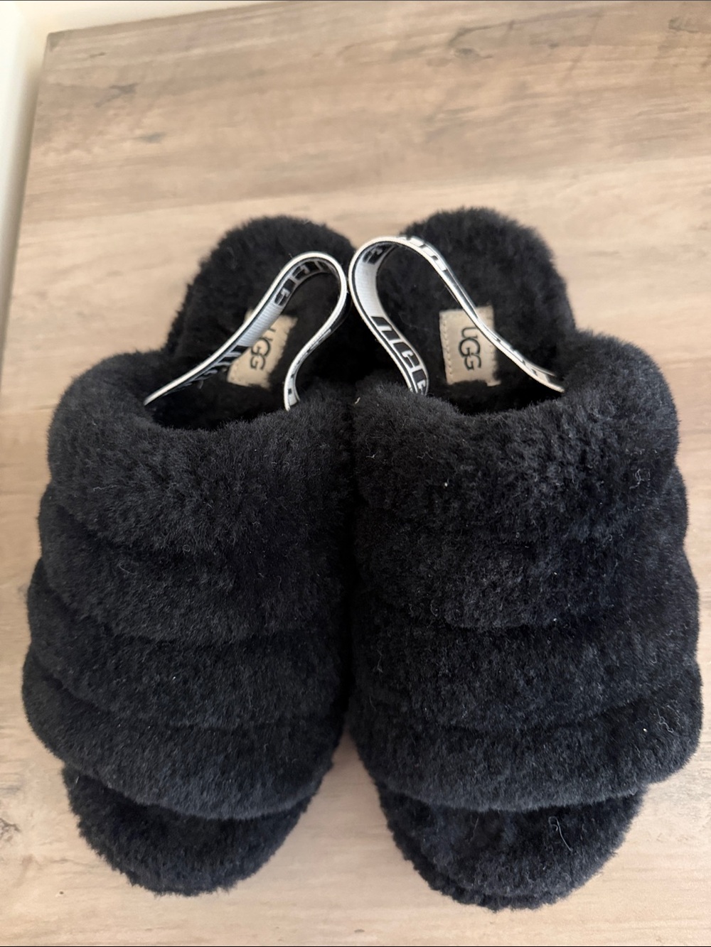 UGG Womens Black Fluff Clog Slippers with Branded Heel Strap